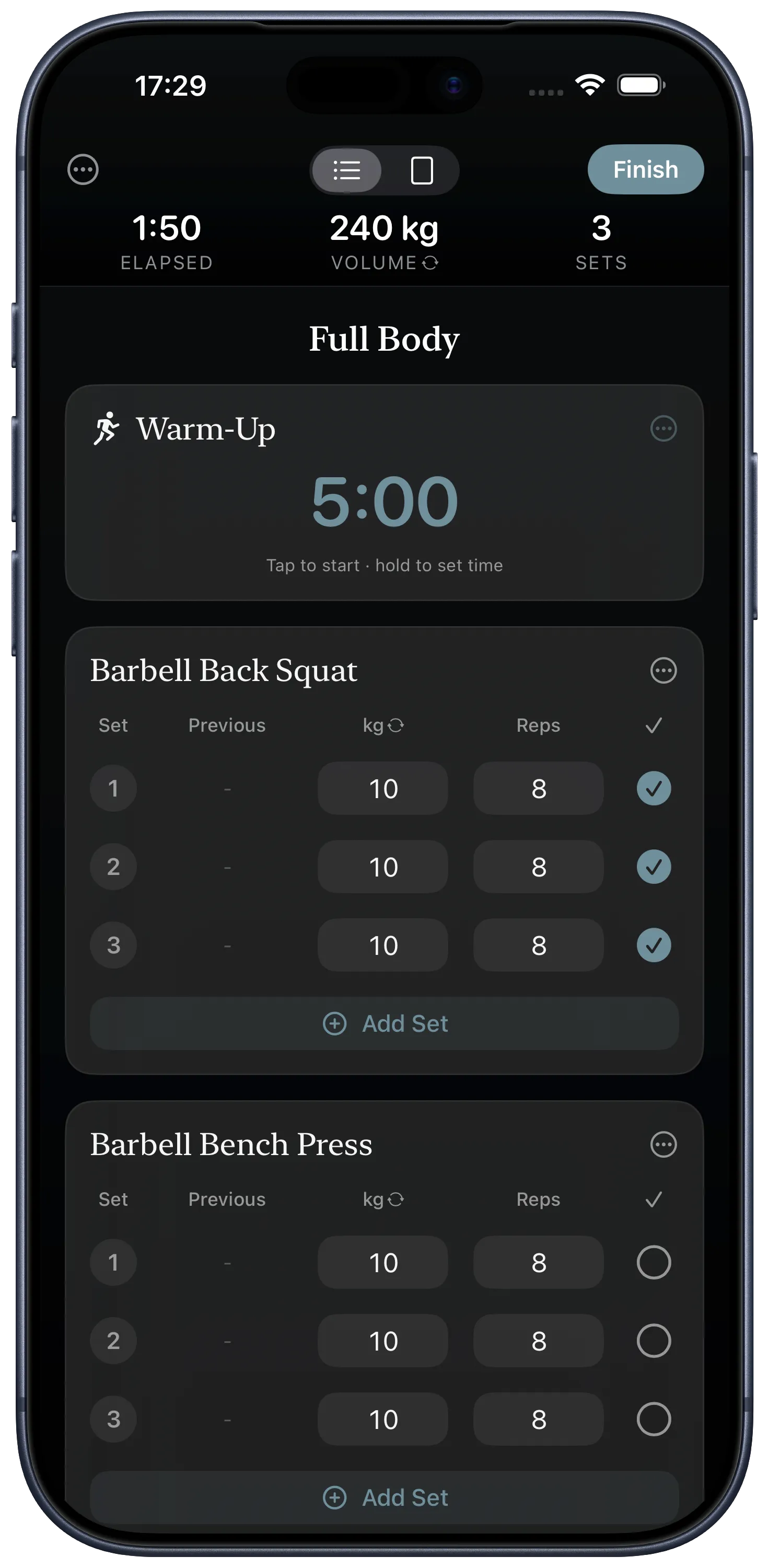 A workout in progress on iPhone, with completed sets and a warm-up timer